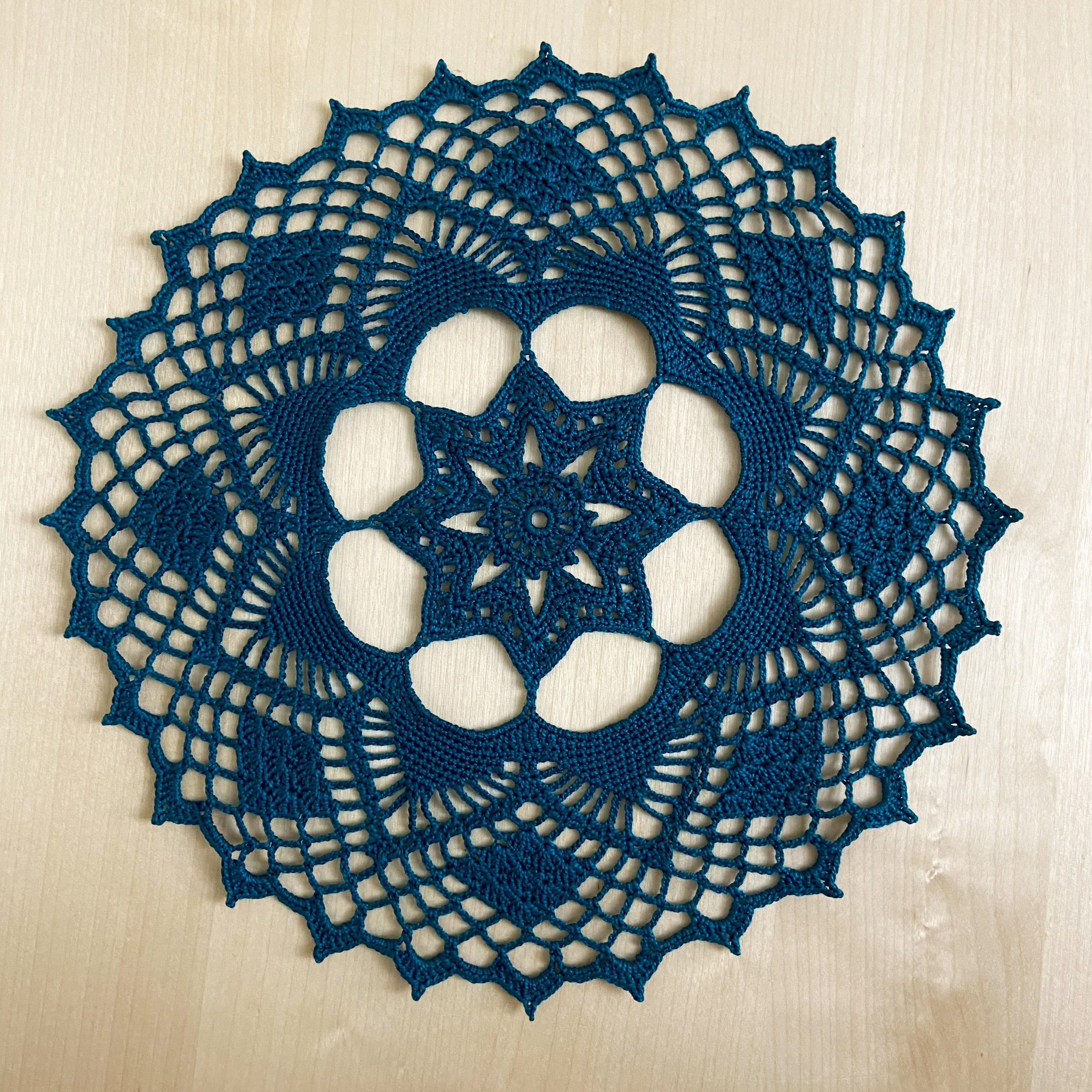 teal crochet doily